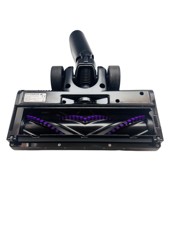 Dyceros Gros plan sur le dessous de l'Aspirateur balai sans fil cyclonique 500W - Brosse spéciale poils d'animaux, mettant en évidence ses poils rotatifs et ses roues sur fond blanc.